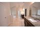 Bathroom featuring double sinks, granite countertops, tile flooring, and a separate shower at 2307 Overlook Ave, Lithonia, GA 30058