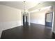 Open-concept dining room leading to the living room at 2307 Overlook Ave, Lithonia, GA 30058