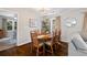 Dining room with hardwood floors and a view into the living room at 5725 Brenda Sw Dr, Mableton, GA 30126