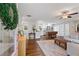 Inviting living area with hardwood floors that flow into the kitchen, featuring a rustic island at 5725 Brenda Sw Dr, Mableton, GA 30126