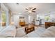 Open-concept living space with a spacious kitchen island and a cozy living area at 5725 Brenda Sw Dr, Mableton, GA 30126