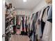 Spacious walk-in closet with plenty of storage for clothes, shoes, and accessories at 5725 Brenda Sw Dr, Mableton, GA 30126