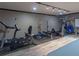 Home gym with a variety of workout equipment including a treadmill, stationary bike, and weight bench at 100 Trotters Ridge, Fayetteville, GA 30215
