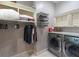 Well-organized laundry room with modern appliances and ample storage space at 100 Trotters Ridge, Fayetteville, GA 30215