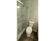 Updated bathroom features a modern glass shower and new fixtures at 2663 Washington Nw St, Atlanta, GA 30318