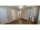 Bedroom features hardwood floors, multiple windows and attached bath at 2663 Washington Nw St, Atlanta, GA 30318