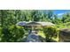 Traditional brick home featuring a charming walkway and lush green landscaping at 2663 Washington Nw St, Atlanta, GA 30318
