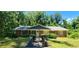 Charming brick home with a well-maintained front yard and mature trees providing ample shade at 2663 Washington Nw St, Atlanta, GA 30318
