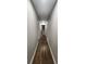 Long hallway features hardwood floors and neutral colored walls at 2663 Washington Nw St, Atlanta, GA 30318