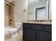 Bathroom with granite countertop, bath tub and shower combination with tile surround at 2767 Durham Ne Dr, Atlanta, GA 30319
