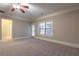 Large bedroom featuring a ceiling fan, a doorway, and access to the outside at 2767 Durham Ne Dr, Atlanta, GA 30319