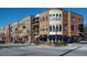 Upscale multi-story brick building with outdoor dining and retail space with awnings and views of street at 2767 Durham Ne Dr, Atlanta, GA 30319