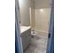 Bathroom with modern vanity, toilet and tub/shower combination at 4805 Madison Point Cir, Austell, GA 30106