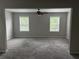 Bonus room with carpet flooring, neutral walls, and natural light from multiple windows at 4805 Madison Point Cir, Austell, GA 30106