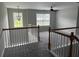 Loft featuring neutral walls, carpet flooring, and natural light from multiple windows at 4805 Madison Point Cir, Austell, GA 30106