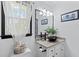 Bathroom features a modern vessel sink, granite counters, and stylish lighting at 12 Ranger Se Rd, Cartersville, GA 30121
