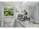 Bright bathroom with modern vessel sink and granite counters with a window view at 12 Ranger Se Rd, Cartersville, GA 30121