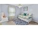 Cozy bedroom with natural light, neutral colors, and comfortable decor at 12 Ranger Se Rd, Cartersville, GA 30121