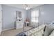 Relaxing bedroom with a white dresser, natural light, and neutral colors at 12 Ranger Se Rd, Cartersville, GA 30121