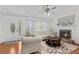 Inviting living room with fireplace, hardwood floors, and natural light at 12 Ranger Se Rd, Cartersville, GA 30121
