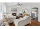 Comfortable living room featuring a fireplace, ceiling fan, and ample seating at 12 Ranger Se Rd, Cartersville, GA 30121