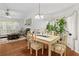 Open concept living space with dining area, living room, and decorative fireplace at 12 Ranger Se Rd, Cartersville, GA 30121