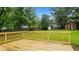 Spacious wooden deck perfect for outdoor entertaining overlooking the backyard at 1328 Hoy Taylor Dr, Norcross, GA 30093