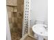 Close up of finished basement bathroom featuring shower, toilet, and sink at 1328 Hoy Taylor Dr, Norcross, GA 30093
