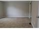 Bedroom offering ample space and a mirrored closet, perfect for storage at 1328 Hoy Taylor Dr, Norcross, GA 30093