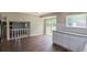 Open-concept kitchen featuring granite counters and access to the backyard at 1328 Hoy Taylor Dr, Norcross, GA 30093