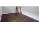 Inviting living room featuring hardwood floors and staircase at 1328 Hoy Taylor Dr, Norcross, GA 30093