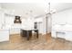Modern kitchen features white cabinets, stainless appliances, and island at 2113 Ella Springs Dr, Covington, GA 30014