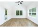 Bright sunroom with door to backyard and lots of natural light at 2113 Ella Springs Dr, Covington, GA 30014