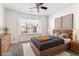 Comfortable bedroom with soft carpet, natural light, and a calming ambiance at 2309 Rolling Trl, Lithonia, GA 30058