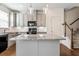Bright kitchen showcasing a kitchen island, granite countertops, and modern pendant lighting at 2309 Rolling Trl, Lithonia, GA 30058