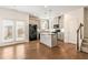 Modern kitchen with stainless steel appliances, a center island, and pendant lighting at 2309 Rolling Trl, Lithonia, GA 30058