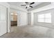 Main bedroom with open bath featuring double sinks at 2309 Rolling Trl, Lithonia, GA 30058