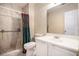 Practical bathroom featuring a tiled shower, neutral walls, and standard fixtures at 3244 Hampton Se Ct, Smyrna, GA 30082
