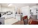 Functional kitchen featuring wood floors, ample counter space, and essential appliances at 3244 Hampton Se Ct, Smyrna, GA 30082