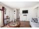 Inviting living room with hardwood floors, providing a comfortable space for relaxation and entertainment at 3244 Hampton Se Ct, Smyrna, GA 30082
