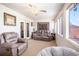 Bright sunroom with plush seating, multiple windows, and tranquil natural light at 3244 Hampton Se Ct, Smyrna, GA 30082