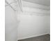 Empty closet featuring wire shelving, gray walls, and gray carpet at 1027 Regency Dr, Acworth, GA 30102