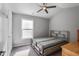 Bedroom featuring carpet floors, neutral paint, and a ceiling fan at 1067 Brownstone Dr # 23, Marietta, GA 30008
