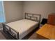 Bedroom with a window and carpet flooring, and modern bed frame with ample natural light at 1067 Brownstone Dr # 23, Marietta, GA 30008