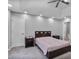 Bedroom featuring carpet floors, neutral paint, a ceiling fan, and a queen-sized bed at 1067 Brownstone Dr # 23, Marietta, GA 30008