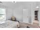 Bedroom featuring carpet floors, neutral paint, and a window with blinds at 1067 Brownstone Dr # 23, Marietta, GA 30008