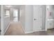 Hallway featuring carpet floors and neutral paint at 1067 Brownstone Dr # 23, Marietta, GA 30008
