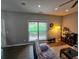 Bright living room boasts dark wood floors, a large window and recessed lighting for a modern feel at 1067 Brownstone Dr # 23, Marietta, GA 30008