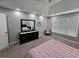 Spacious main bedroom featuring plush carpeting, recessed lighting, and a neutral color scheme at 1067 Brownstone Dr # 23, Marietta, GA 30008