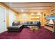 Finished basement with wood ceilings, comfortable seating and television perfect for entertaining at 2004 Spicers Ln, Woodstock, GA 30189
